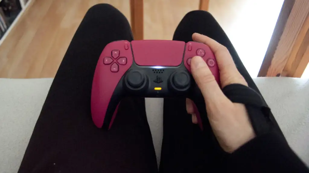 game subscriptions: InclusiveGameLab Person-with-PS5-Controller 8 CC-BY-SA