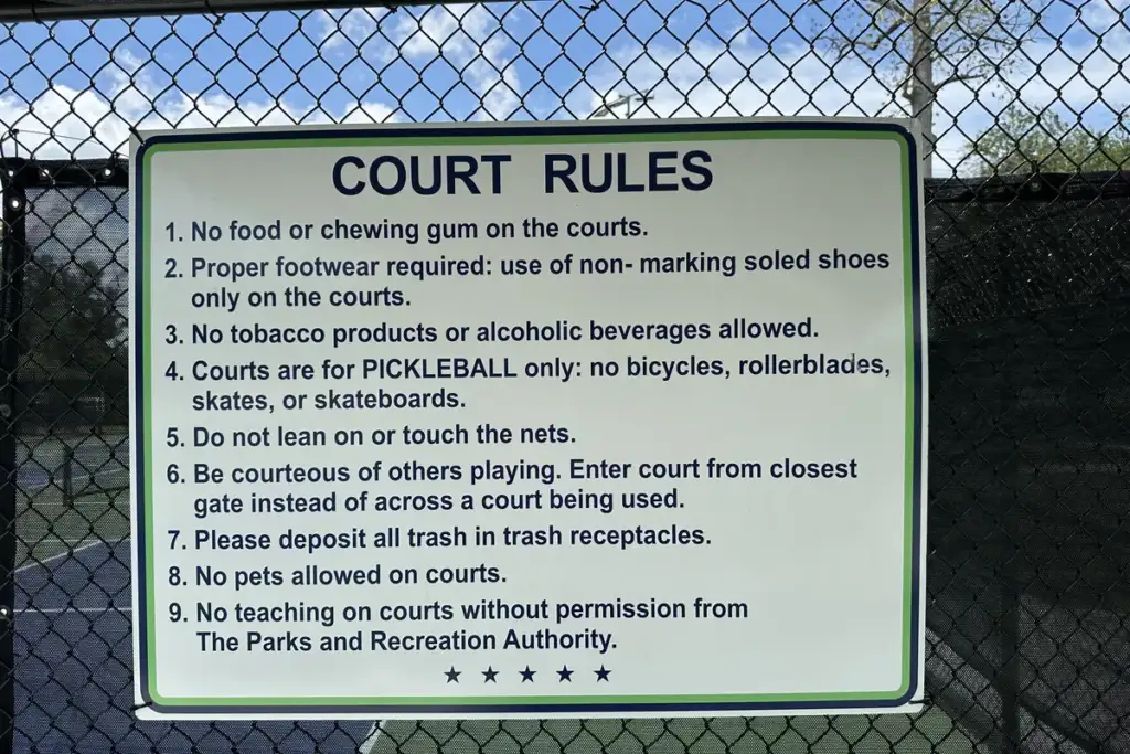 pickleball rules: court rules sign at a public pickleball court