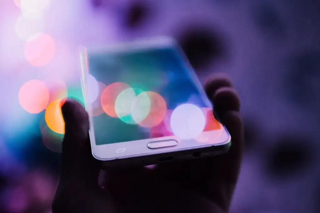 SIM swap: person holding smartphone their hand