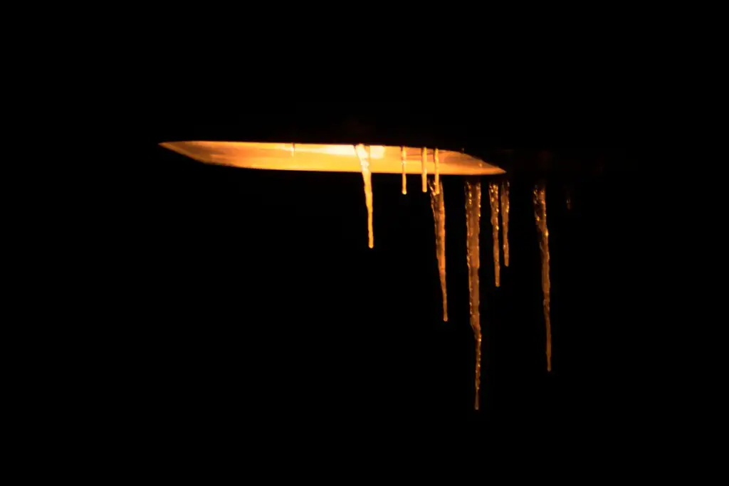 winter weather forecast: Icicles on a street lamp